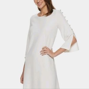 Nina Leonard Ivory Sheath elegant summer  dress with pearl on the sleeves.